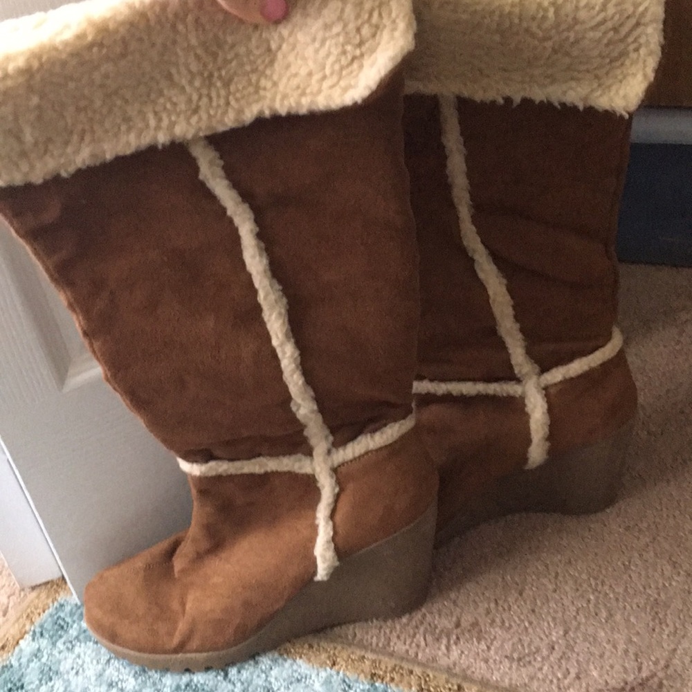 Knee high faux suede boots.